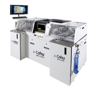 Cohu's MH-3300 High-Speed Laser Mark Handler at an off center angle. The handler is an off white color with a monitor attached to it.